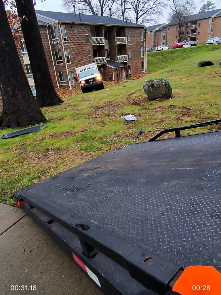 I got Whipz Towing & Roadside Assistance with a white & orange U-Haul winching near me from carnay hall cir Randallstown, MD 21133 to Pilkeswood dr Randallstown, MD 21133