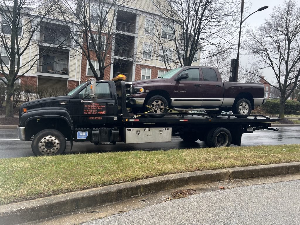I got Whipz Towing & Roadside Assistance with a purple dodge Ram 1500 towing near me from 10200 twin rivers rd Columbia, MD 21044 to 10735 Little Patuxent Pkwy, Columbia, MD 21044