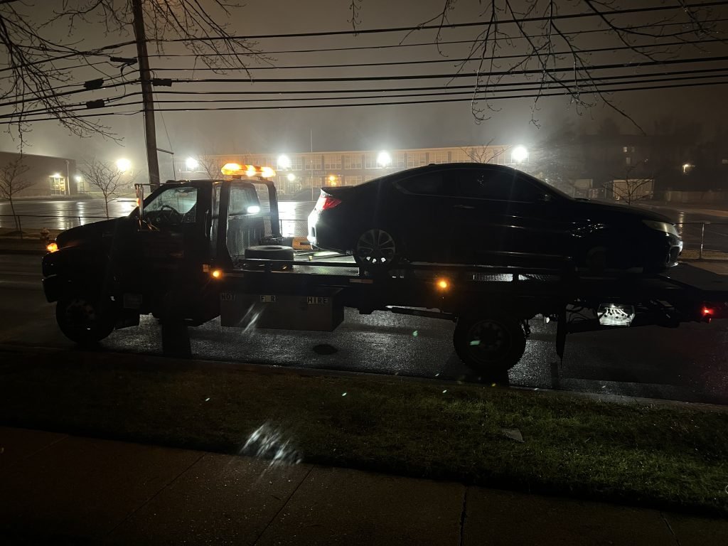 I got Whipz Towing & Roadside Assistance with a black honda coupe towing near me from 7000 Dogwood Rd Windsor Mill, MD 21244 to 4200 Maine Ave Gwynn Oak, MD 21207