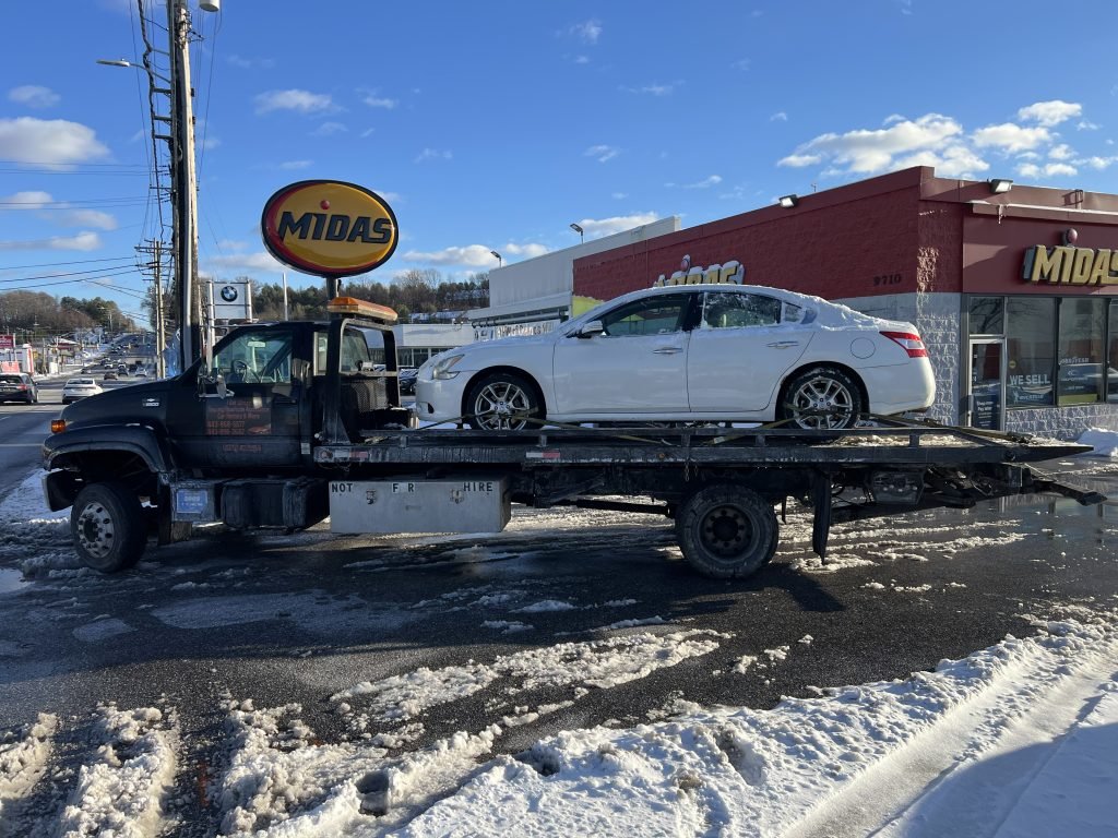 I got Whipz Towing & Roadside Assistance with a white nisaan maxima towing near me from 9710 Reisterstown Rd, Owings Mills, MD 21117 to 5621 Old Frederick Rd, Catonsville, MD 21228