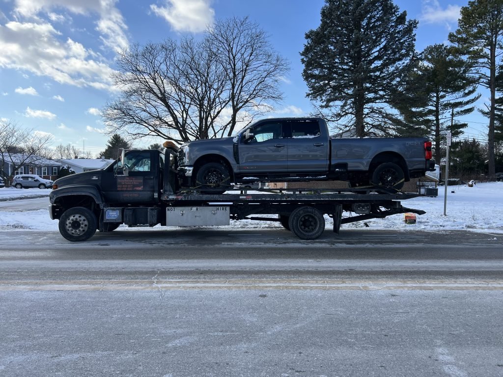I got Whipz Towing & Roadside Assistance with a blue Ford F-350 towing near me from 700 Crosby Rd, Catonsville, MD 21228 to 8908 Kelso Dr, Essex, MD 21221