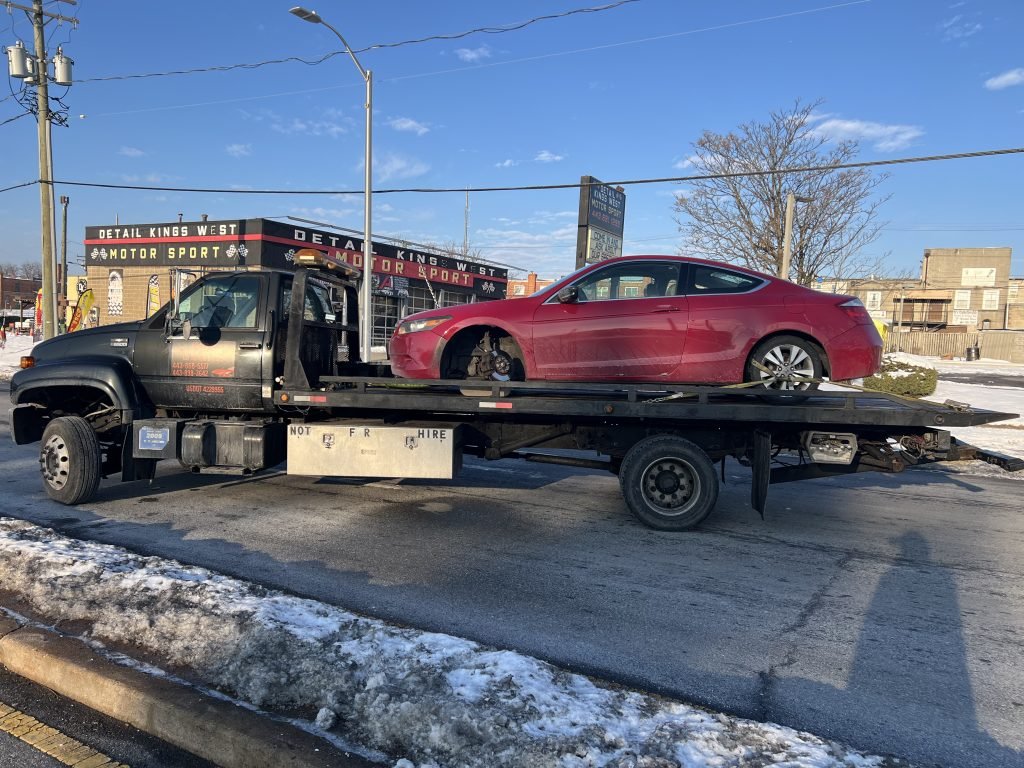 I got Whipz Towing & Roadside Assistance with a red Honda accord coupe towing near me from 4100 W Northern Parkway Baltimore, MD 21215 to 3800 Rockfield ave Baltimore, MD 21215