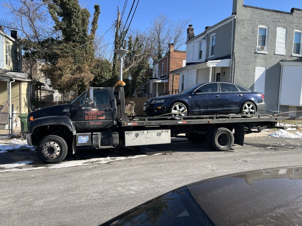 I got Whipz Towing & Roadside Assistance with a blue Audi A4 towing near me from 4100 Wilsby ave Baltimore, MD 21218 to 9800 York rd Cockeysville, MD 21030