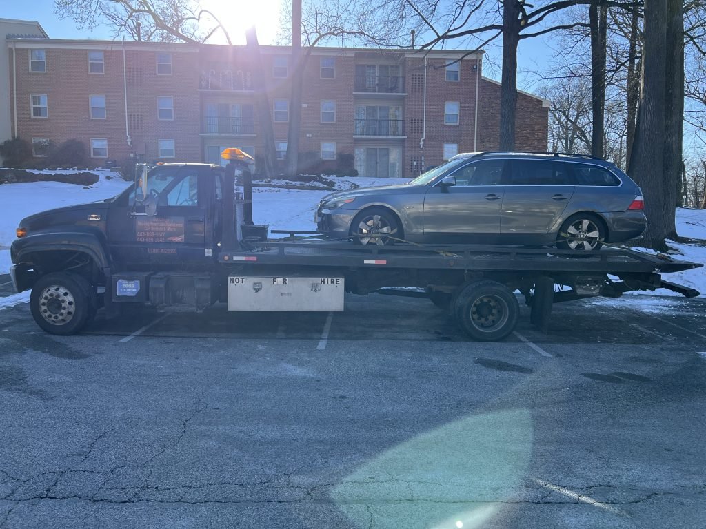 I got Whipz Towing & Roadside Assistance with a grey bmw 5 series wagon towing near me from 1100 Ivywood ln Towson, MD 21286 to 600 S Smallwood st Baltimore, MD 21223