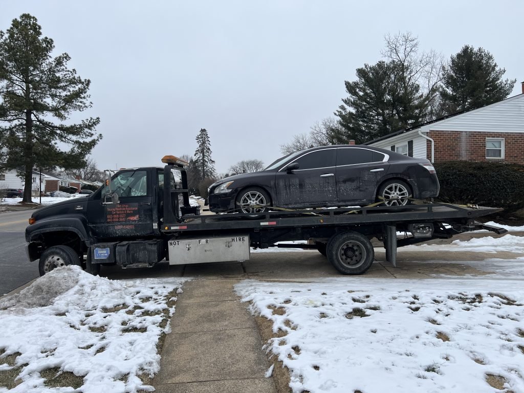 I got Whipz Towing & Roadside Assistance with a purple nissan maxima towing near me from 3700 offutt rd Randallstown, MD 21133 to 2617 Reiserstown rd Baltimore, MD 21217