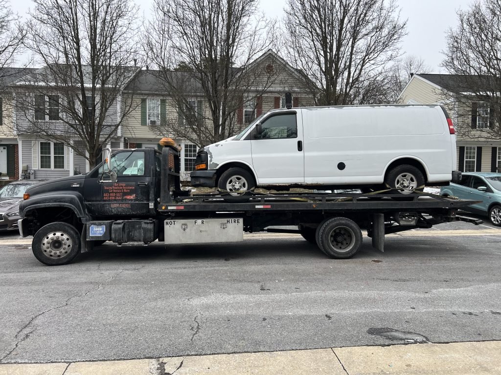 I got Whipz Towing & Roadside Assistance with a white chevy work van towing near me from 1 Rand ct Windsor Mill, MD 21244 to 1101 N rolling rd Catonsville, MD 21228