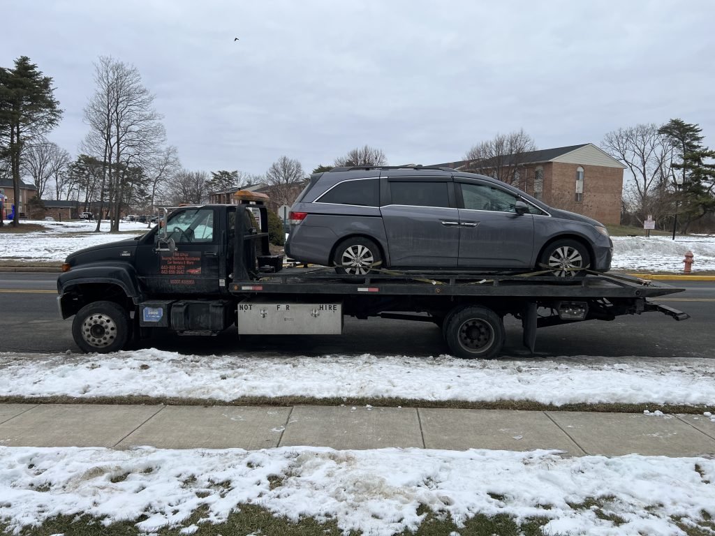 I got Whipz Towing & Roadside Assistance with a grey Honda Odyssey towing near me from 7400 Fairbrook rd Windsor Mill, MD 21244 to 8800 kelso dr Essex, MD 21221
