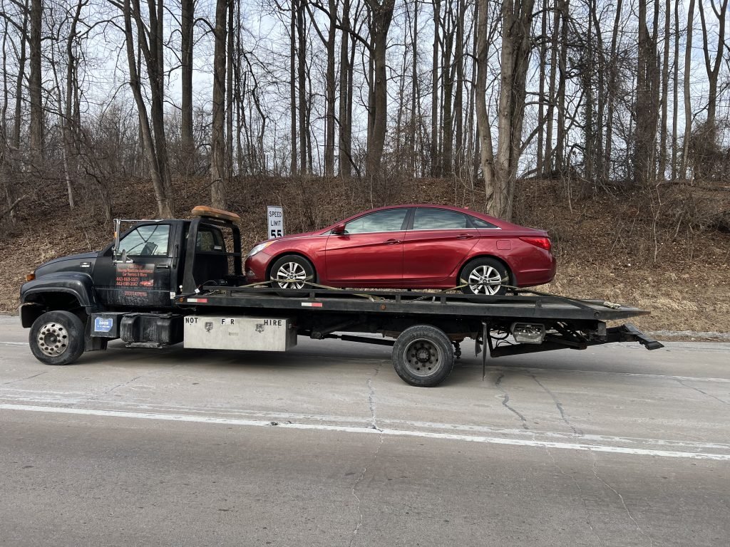 I got Whipz Towing & Roadside Assistance with a red hyundai sonata towing near me from i-70 & 695 to Taneytown, MD