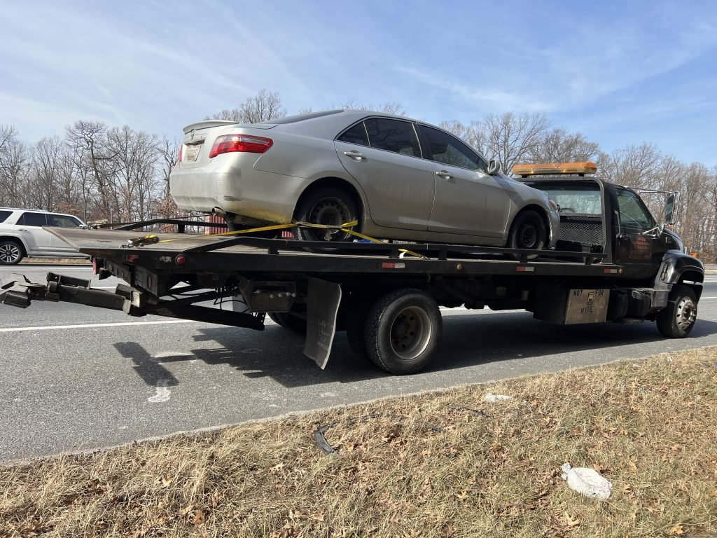 I got Whipz Towing & Roadside Assistance with a grey Toyota Camry towing near me from MD I-95 & I-695 to 2100 Mount Holly st Baltimore, MD 21216