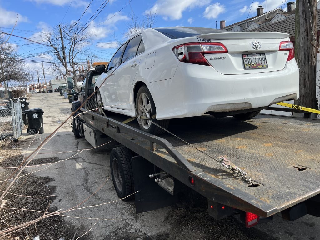 I got Whipz Towing & Roadside Assistance with a white toyota camry towing near me from 7100 holabird ave Dundalk, MD 21222 to Nottingham, MD 21236