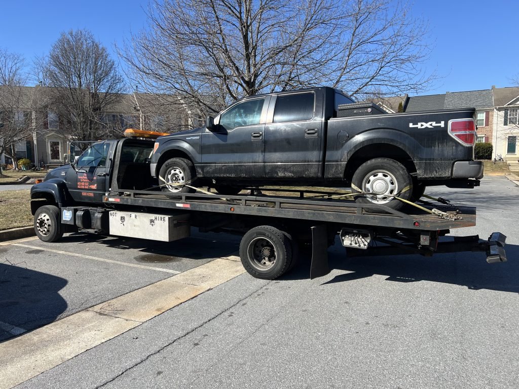 I got Whipz Towing & Roadside Assistance with a blk Ford F150 towing towing near me from 9200 Christo Ct Owings Mills, MD 21117 to 7000 Security Blvd Woodlawn, MD 21244