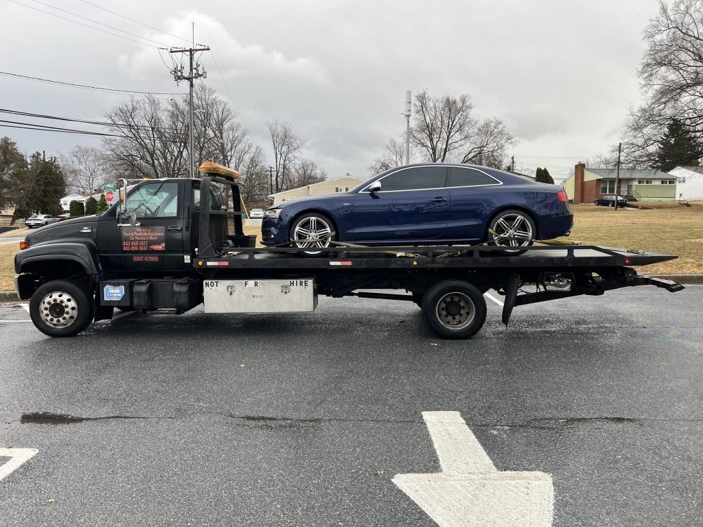 I got Whipz Towing & Roadside Assistance with a blue audi a5 towing near me from 3330 Washington Ave Windsor Mill, MD 21244 to Philadelphia, PA