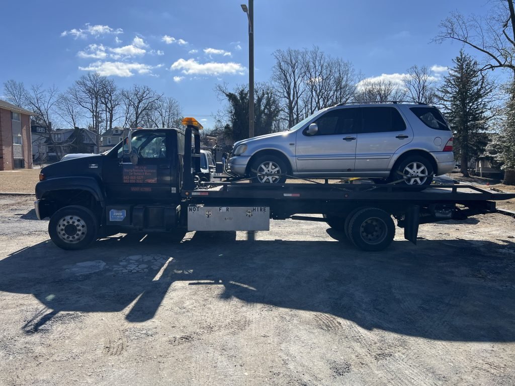 I got Whipz Towing & Roadside Assistance with a silver mercedes ml320 towing near me from 5500 Gwynn Oak ave Gwynn Oak, MD 21207 to 5800 Oakleaf ave Baltimore, MD 21215