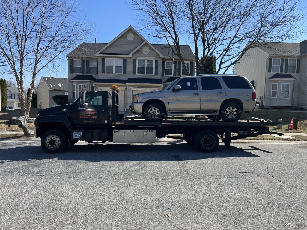 I got Whipz Towing & Roadside Assistance with a grey cadillac escalade towing near me from 3200 Kelox rd lochearn, MD 21207 to 3840 Windsor Mill rd, Milford Mill 21244