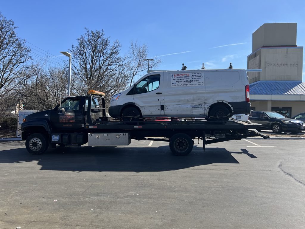 I got Whipz Towing & Roadside Assistance with a white ford transit towing near me from 7405 liberty rd Baltimore, MD 21207 to 2100 Woodlawn Dr Woodlawn, MD 21207