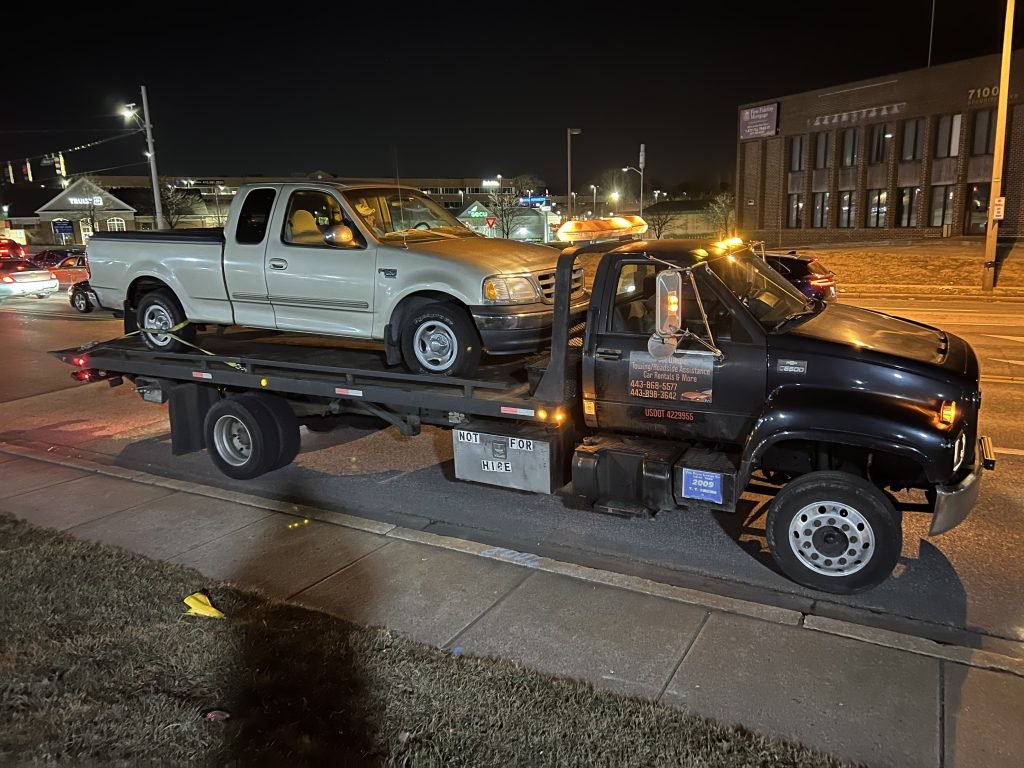 I got Whipz Towing & Roadside Assistance with a silver ford F-150 towing near me from 2000 rolling rd Windsor Mill, MD 21244 to 3800 cassandra rd Randallstown, MD 21133