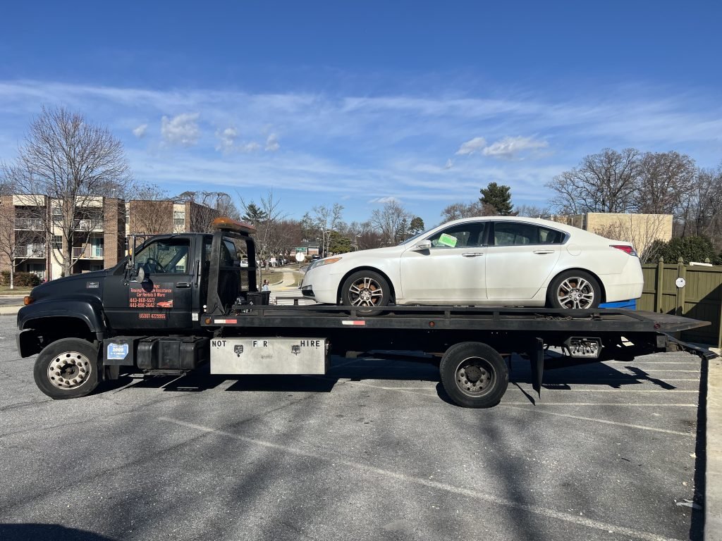 I got Whipz Towing & Roadside Assistance with a white acura tl towing near me from 24 greenbury ct Gwynn Oak, MD 21207 to 7400 Shirley rd Gwynn Oak, MD 21207
