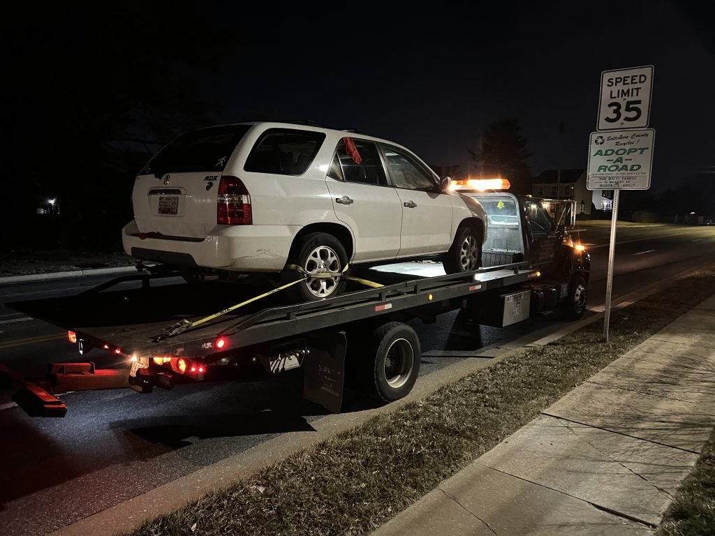 I got Whipz Towing & Roadside Assistance with a white acura mdx towing near me from 2513 rolling rd Milford Mill, MD 21244 to 7110 Liberty rd Lochearn, MD 21207