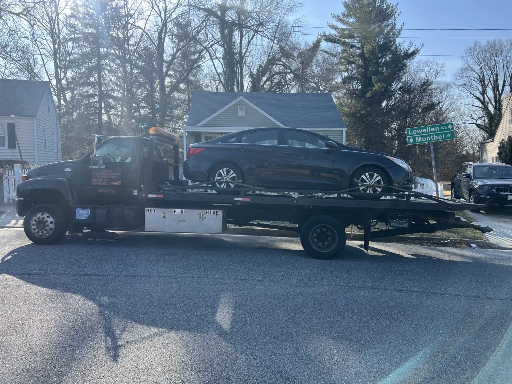 I got Whipz Towing & Roadside Assistance with a blk hyundai sonata towing near me from 5400 montbel ave baltimore, MD 21207 to 142 Halesworth rd Cockeysville, MD 21030