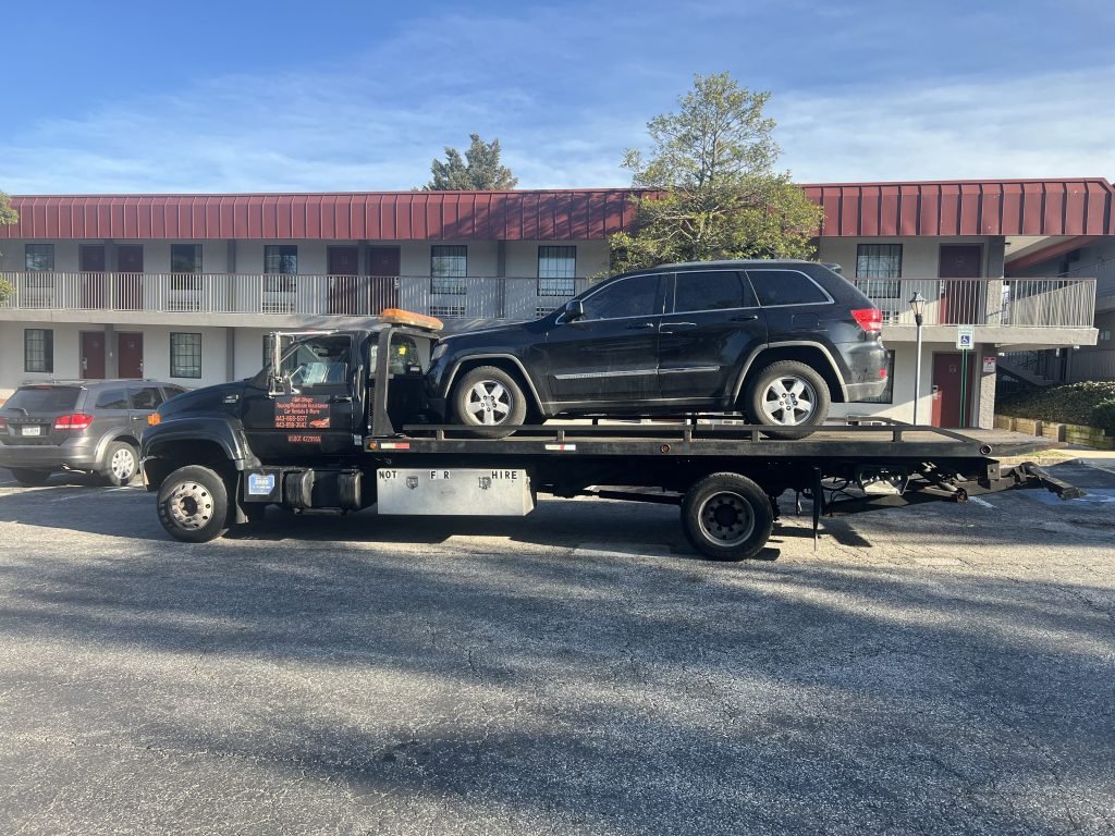 I got Whipz Towing & Roadside Assistance with a blk jeep cherokee towing near me from 1660 Whitehead ct Baltimore, MD 21207 to 1506 woodlawn dr Baltimore, MD 21207