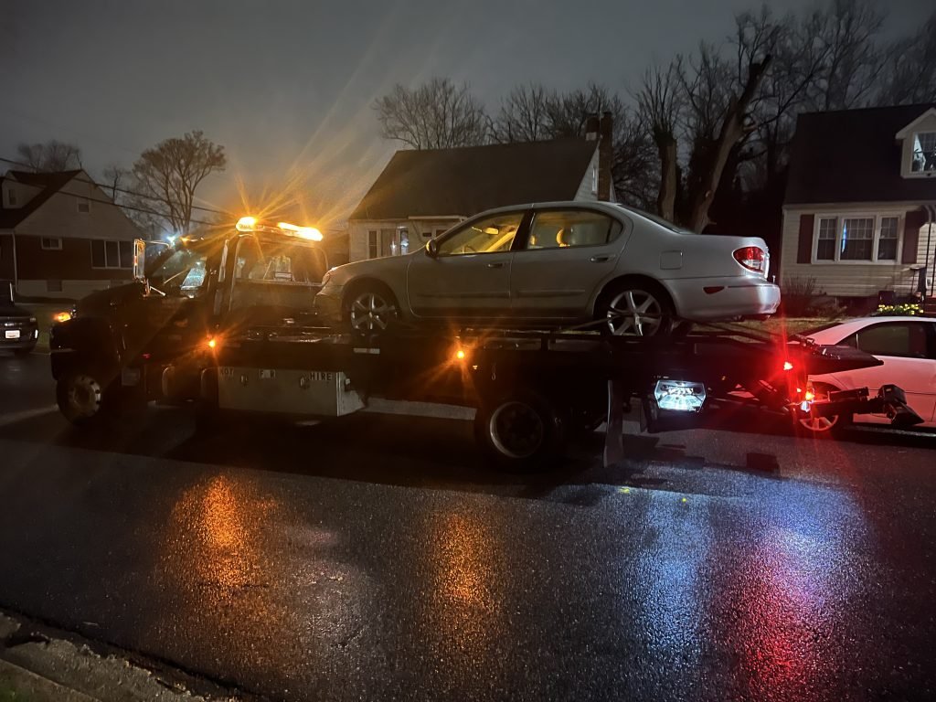 I got Whipz Towing & Roadside Assistance with a grey infiniti j30 towing near me from 7126 marston rd Lochearn, MD 21207 to 8901 executive center rd ellicott city, MD 21043