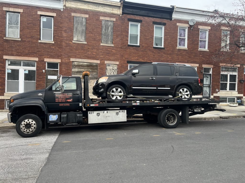 I got Whipz Towing & Roadside Assistance with a black nissan Armata towing near me from 2000 Harlem ave Baltimore, MD 21217 to 2600 E.25th st Baltimore, MD 21213