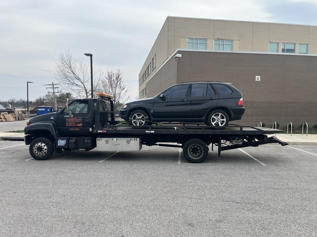 I got Whipz Towing & Roadside Assistance with a black Bmw X5 towing near me from 4505 Liberty Heights ave Baltimore, MD 21207 to 3305 Elgin ave Baltimore, MD 21216
