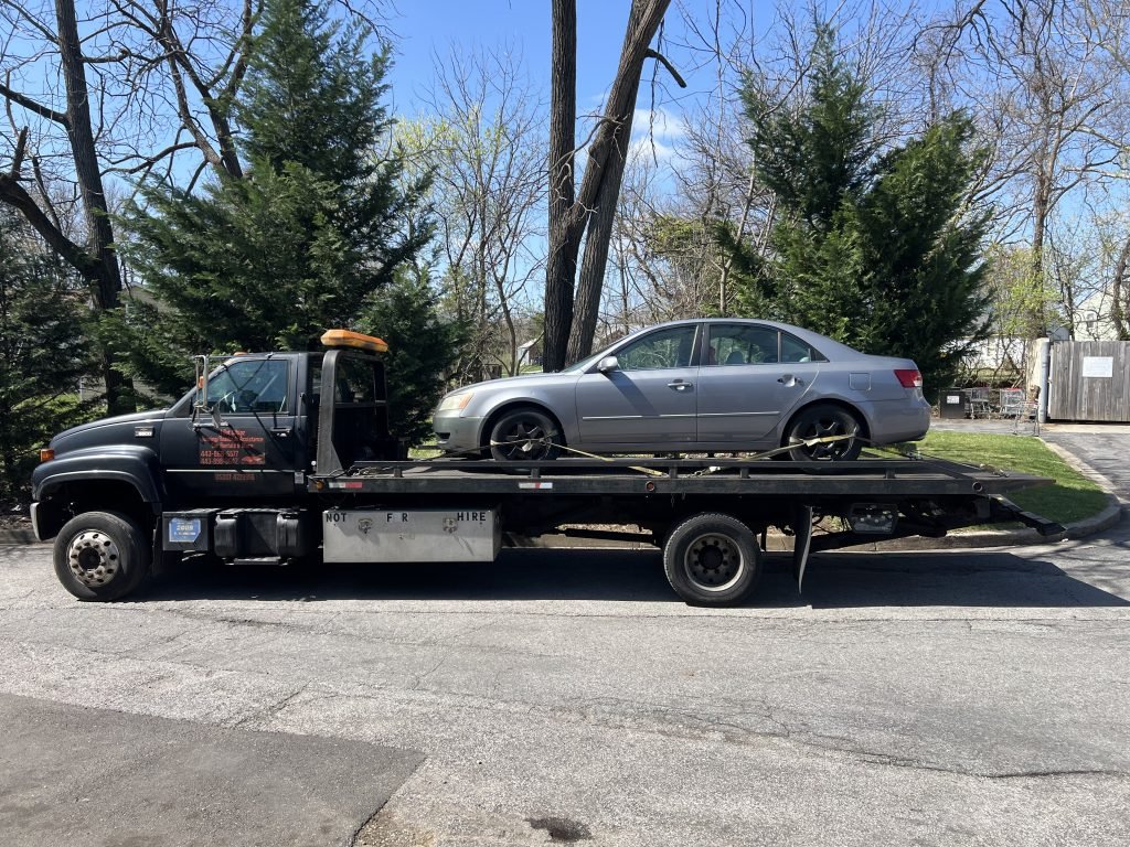 I got Whipz Towing & Roadside Assistance with a grey hyundai elantra towing near me from 1806 Belmont Windsor Mill, MD 21244 to 2801 Hawkins Point Baltimore, MD 21226