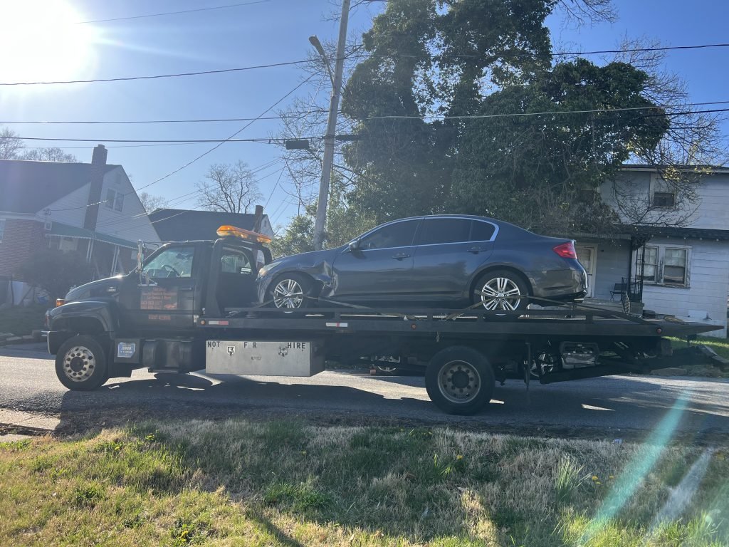 I got Whipz Towing & Roadside Assistance with a grey infiniti g35 towing near me from 2101 Sunbriar rd Woodlawn, MD 21207 to 6214 Reiserstown rd Baltimore, MD 21215