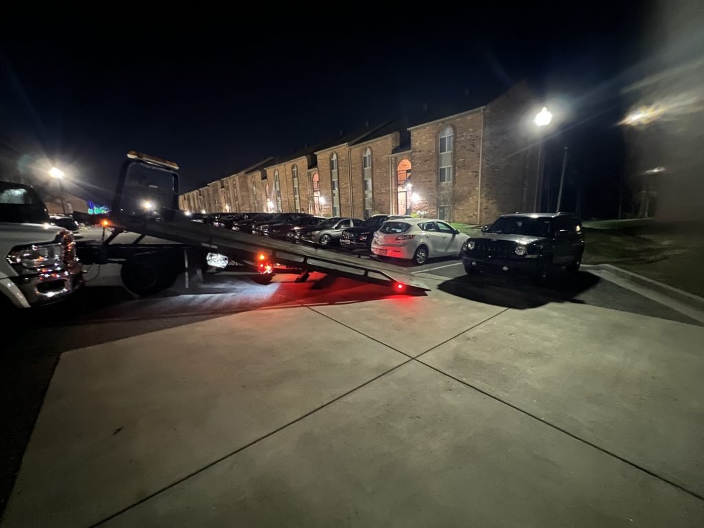 I got Whipz Towing & Roadside Assistance with a black jeep patriot towing near me from (39.2756404, -76.7247780) to 7 Woodbriar ct Windsor Mill, MD 21244