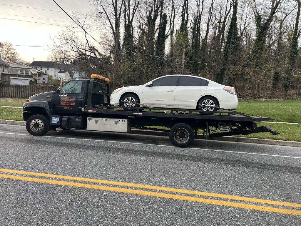I got Whipz Towing & Roadside Assistance with a white nissan altima towing near me from 1688 North Forest Park Avenue, Gwynn Oak, MD 21207 to 13 e pleasant hill rd Owings Mills, MD 21117