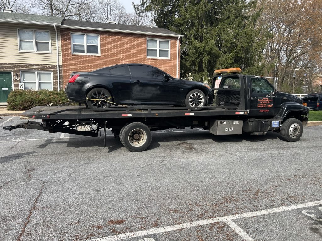 I got Whipz Towing & Roadside Assistance with a black infiniti g37 coupe towing near me from 2801 Forest Glen Road, Baltimore, MD 21216 to 2810 Hammonds Ferry Road, Halethorpe, MD 21227