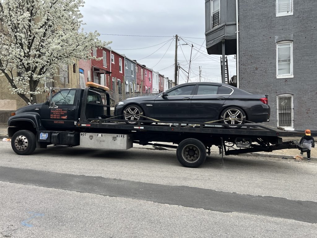 I got Whipz Towing & Roadside Assistance with a grey bmw 750 towing near me from 2149 Hollins Street, Baltimore, MD 21223 to 14725 baltimore ave laurel, MD 20707