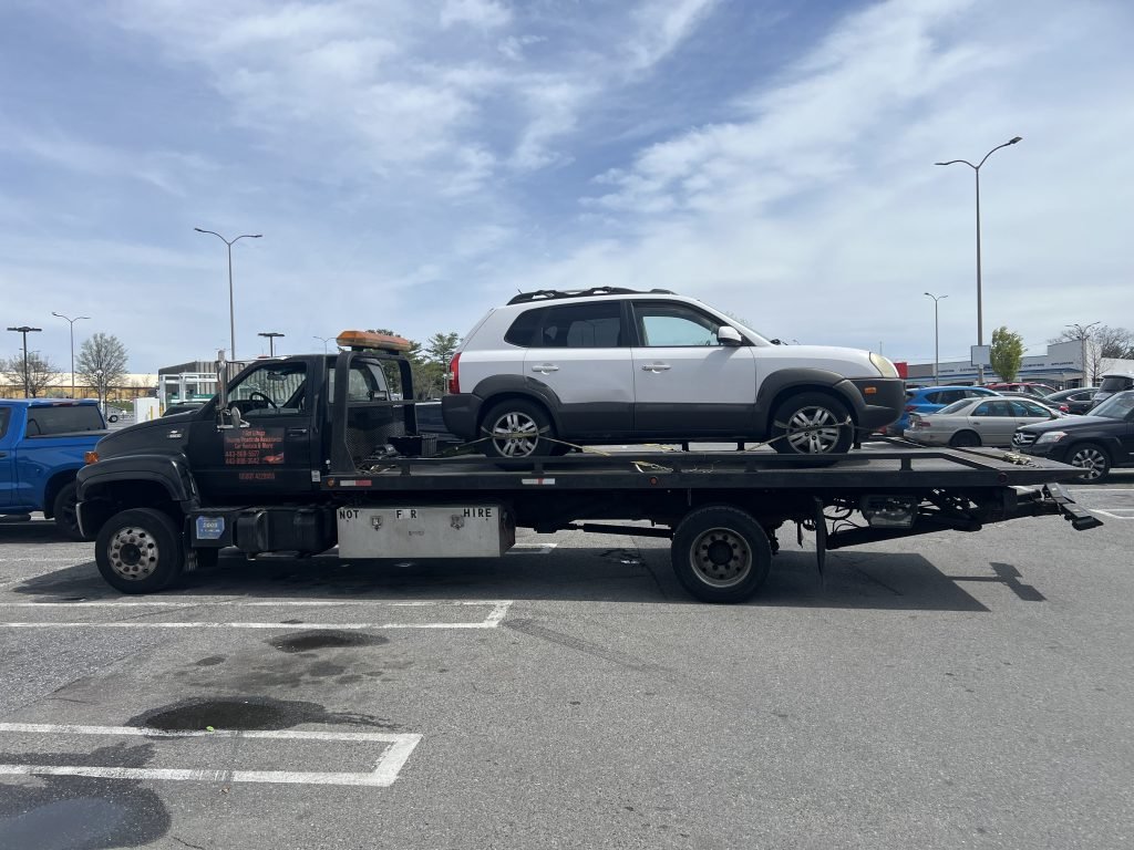 I got Whipz Towing & Roadside Assistance with a white hyundai santa fe towing near me from 5708 wabash ave Baltimore, Md 21215 to 1816 woodlawn dr Woodlawn, MD 21207