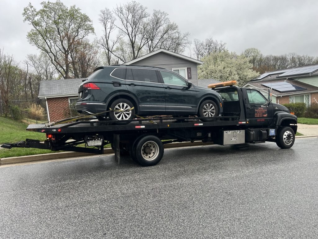 I got Whipz Towing & Roadside Assistance with a green volkswagen tiguan towing near me from 6822 Fox Meadow Road Gwynn Oak, MD 21207 to 9215 Harford rd Parkville, MD 21234