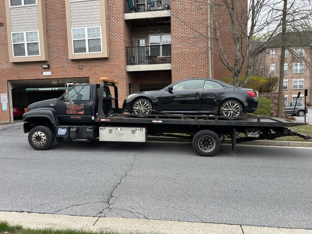 I got Whipz Towing & Roadside Assistance with a black infiniti g37 coupe towing near me from 4817 Coyle Rd, Owings Mills, MD 21117 to 6600 baltimore national pike baltimore md 21228