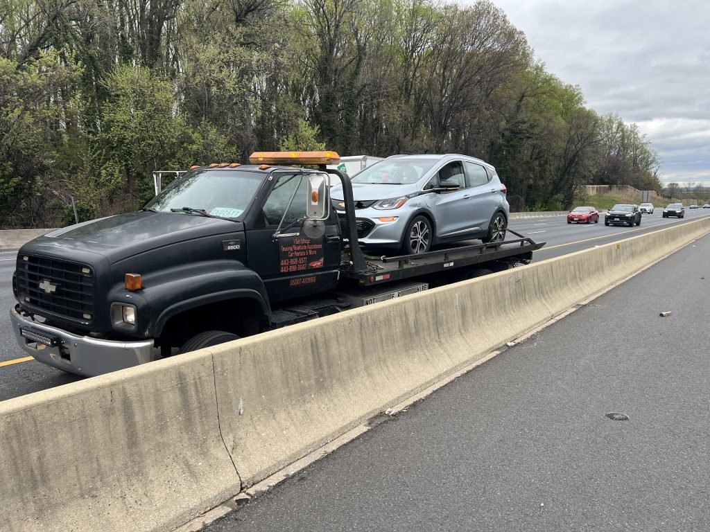 I got Whipz Towing & Roadside Assistance with a blue chevy hybrid coupe towing near me from 39.28268° N, 76.73249° W to 6633 security blvd baltimore, MD 21207