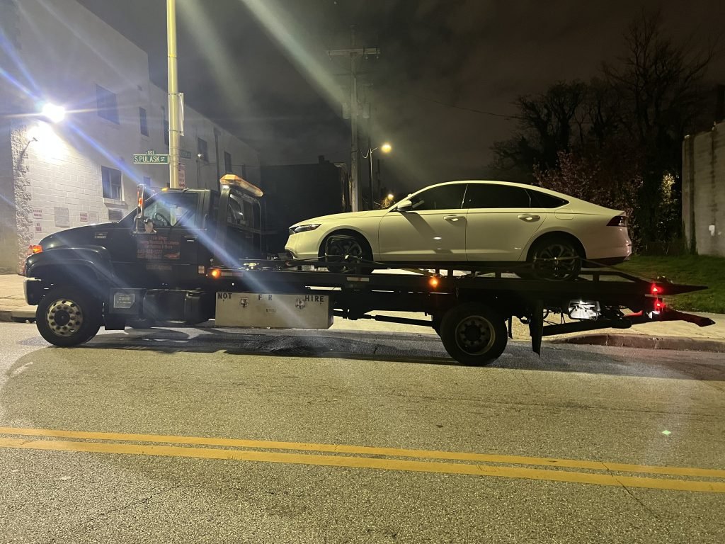 I got Whipz Towing & Roadside Assistance with a white honda accord towing near me from 10 South Pulaski Street, Baltimore, MD 21223 to 6437 Harford Rd, Baltimore, MD 21214