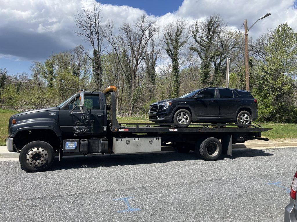 I got Whipz Towing & Roadside Assistance with a blk GMC terrain towing near me from 2053 North Rosedale Street, Baltimore, MD 21216 to 5813 Royal Oak Avenue, Baltimore, MD 21207
