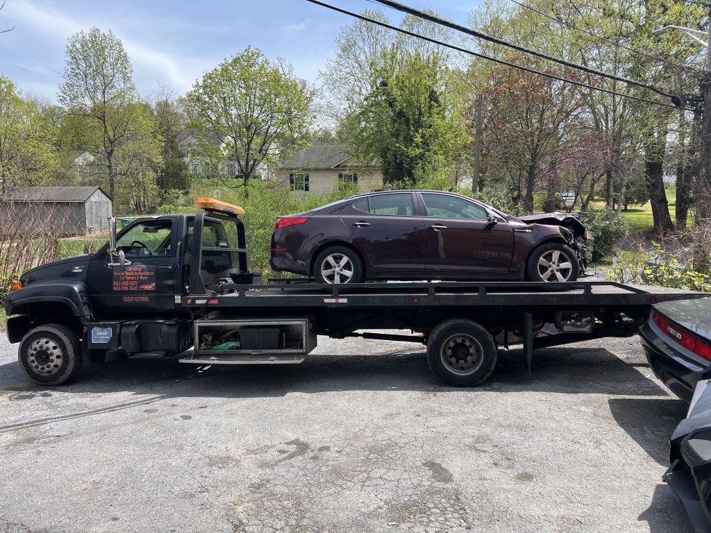 I got Whipz Towing & Roadside Assistance with a purple hyundai elantra towing near me from 6201 washington blvd elkridge md 21075 to 2850 Liberty Heights Avenue, Baltimore, MD 21215