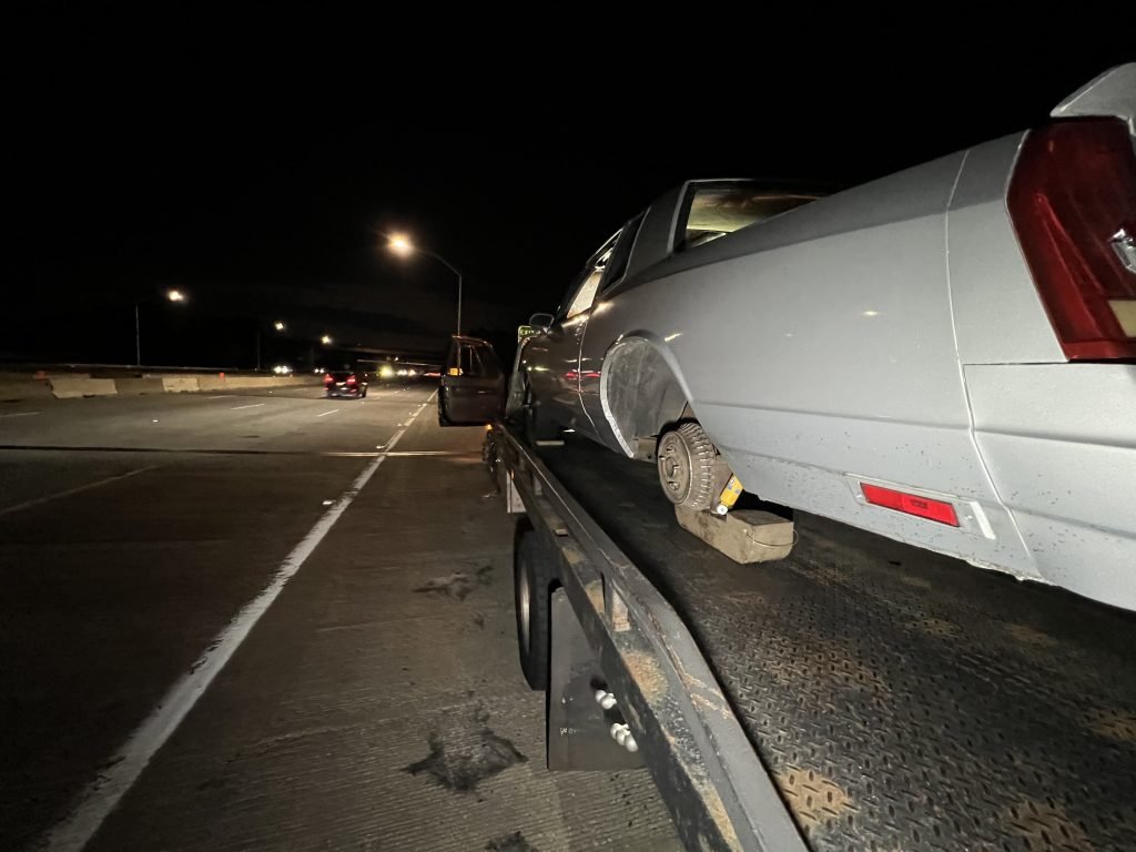 I got Whipz Towing & Roadside Assistance with a grey classic monte carlo coupe towing near me from 39°22'39.0"N 76°44'40.4"W to 4119 Raleigh Rd, Pikesville, MD 21208
