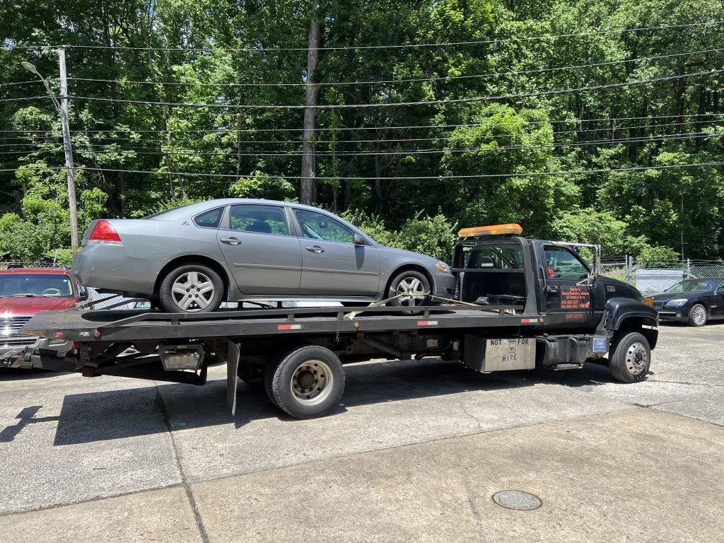 I got Whipz Towing & Roadside Assistance with a grey chevy impala towing near me from 4821 Windsor Mill Rd, Baltimore, MD 21207 to 7520 Hithergreen Dr, Windsor Mill, MD 21244