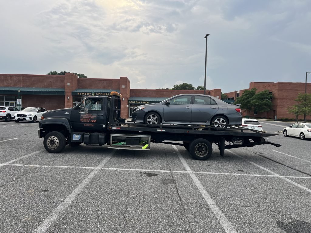 I got Whipz Towing & Roadside Assistance with a grey toyota corolla sedan towing near me from 39.312182, -76.741246 to 39.366562, -76.754064