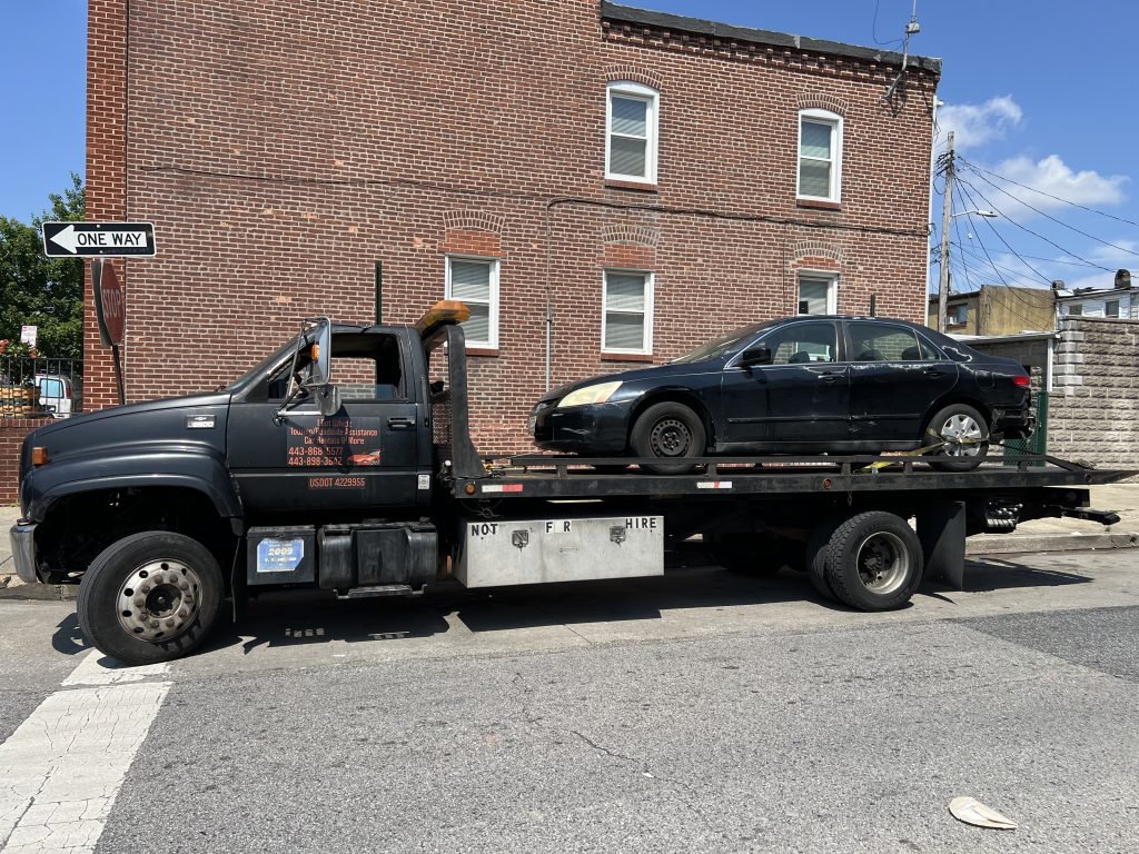 I got Whipz Towing & Roadside Assistance with a blk honda accord sedan towing near me from 3800 E Lombard St, Baltimore, MD 21224 to 4130 Emmart Ave, Baltimore, MD 21215