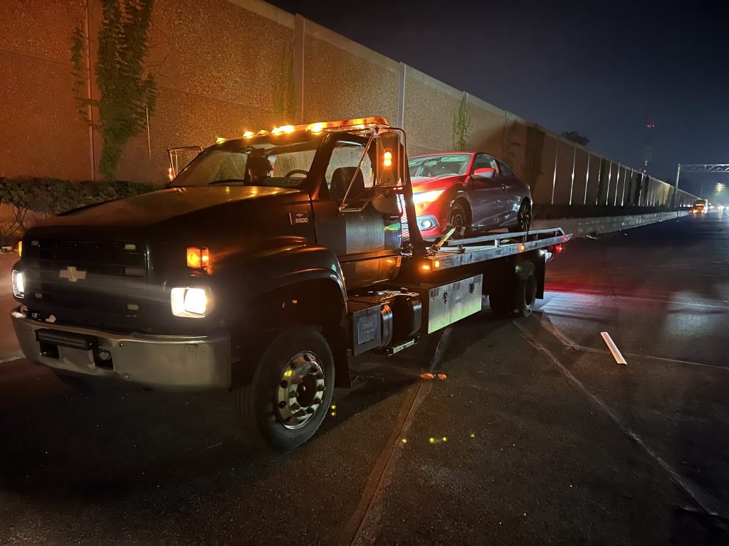 I got Whipz Towing & Roadside Assistance with a red honda civic sedan towing near me from 39.275866, -76.724913 to 10337 Society Park Dr, Cockeysville, MD 21030