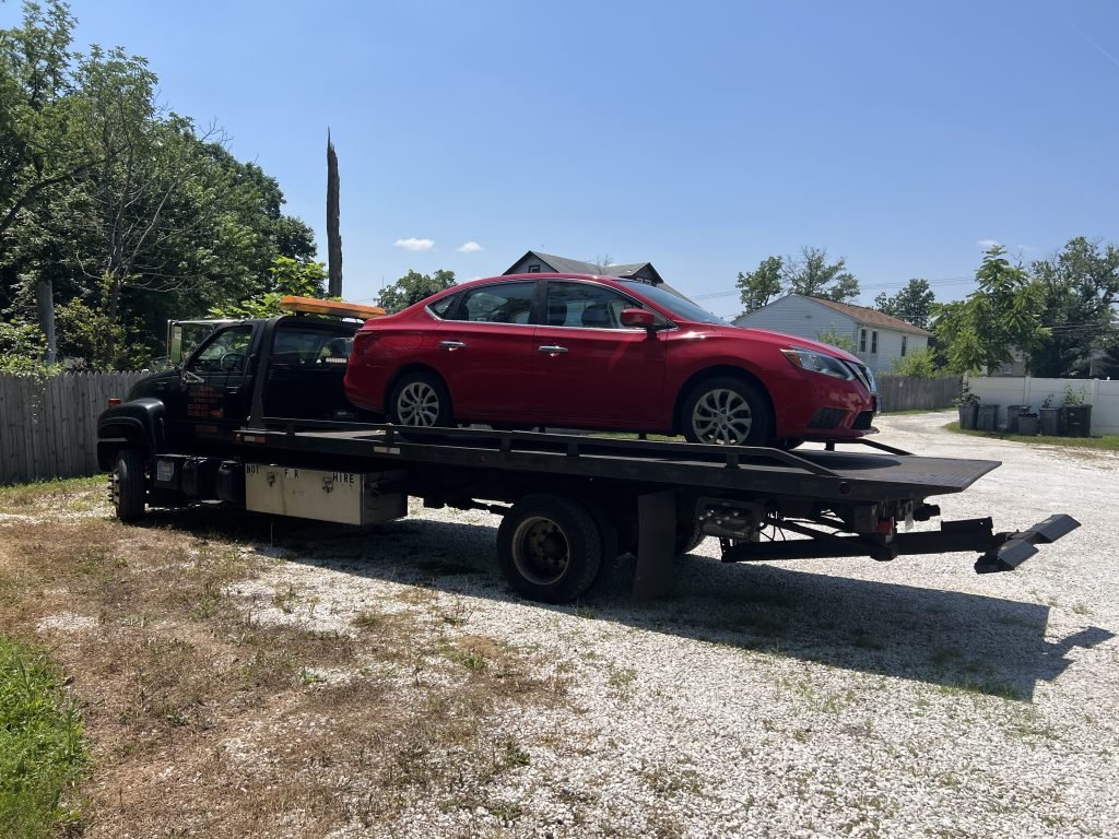 I got Whipz Towing & Roadside Assistance with a red nissan sentra sedan towing near me from 2113 meadowview dr lochearn, MD 21207 to 39.321187, -76.742568