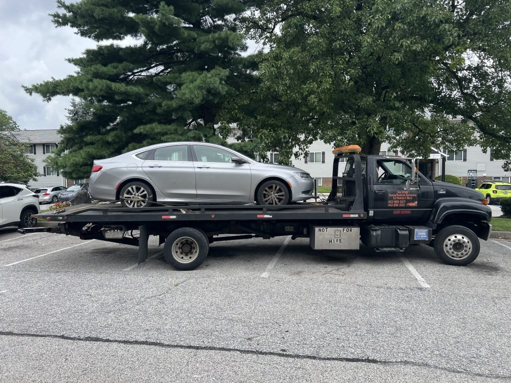 I got Whipz Towing & Roadside Assistance with a silver chrysler 200 sedan towing near me from 3 brubar ct Lochearn,MD 21207 to 5420 Reiserstown rd Baltimore,MD 21215