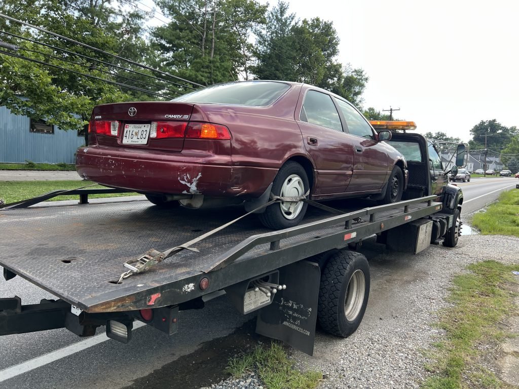 I got Whipz Towing & Roadside Assistance with a red toyota camry sedan towing near me from 6514 dogwood rd Woodlawn,MD 21207 to 2500 lauretta avenue Baltimore,MD 21223
