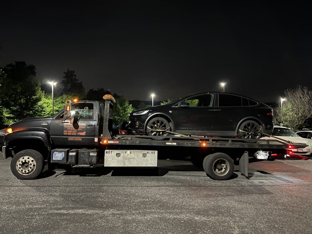 I Got Whipz Towing & Roadside Assistance with a Black Tesla model X suv towing near me from 1100 Old Elkridge Landing Rd, Linthicum Heights, MD 21090 to Washington Blvd #3585, Halethorpe, MD 21227