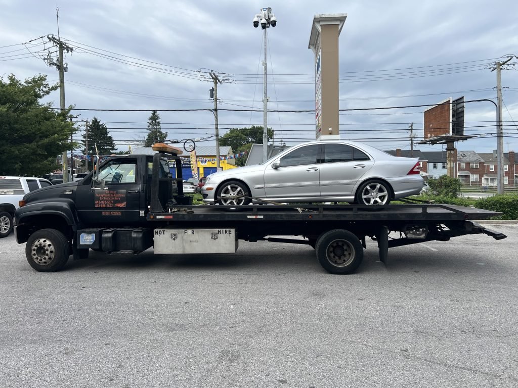 I Got Whipz Towing & Roadside Assistance with a silver mercedes-benz e series sedan towing near me from 5431 Reisterstown Rd, Baltimore, MD 21215 to 8709 1/2 Liberty Rd, Randallstown, MD 21133